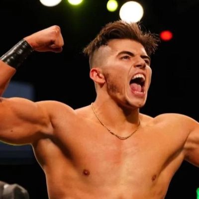 He is flexing his biceps in the picture.